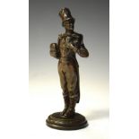 Bronze patina finish Dickensian figure, weighed base, 15.5cm high Condition: Some light surface