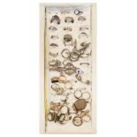 Quantity of dress rings etc Condition: Some of these items appear to have been metal detector