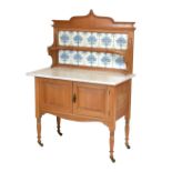 Satin birch or walnut marble top washstand, 130cm high x 90cm wide approx Condition: Watermarks to