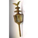 Single brass carriage lamp, having eagle finial to top, 74cm long Condition: Signs of oxidisation in