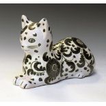 Tin glazed ceramic model of a cat, 33cm long Condition: Overall crazing. **Due to current lockdown