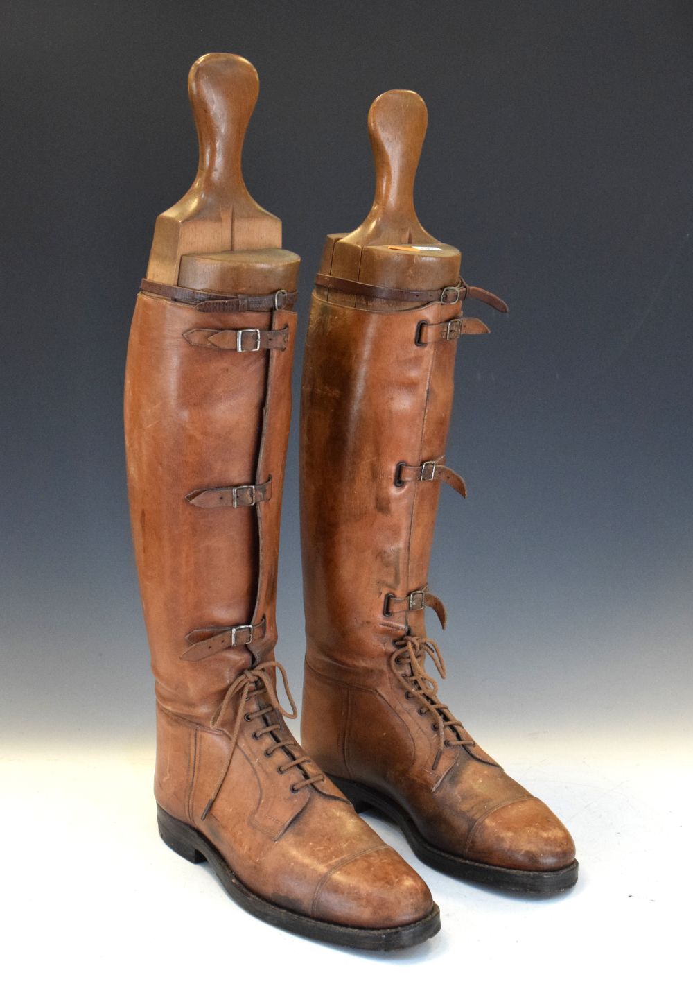 Pair of vintage brown leather riding boots with trees Condition: Scratches and wear to the