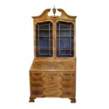 Early 20th Century Continental walnut and mahogany bureau bookcase