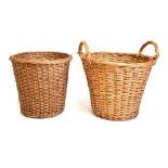 Two wicker baskets and a brass fire surround