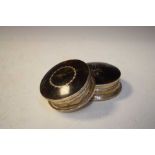 Two silver and tortoiseshell circular boxes