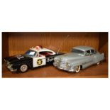 Two Japanese tinplate cars to include;