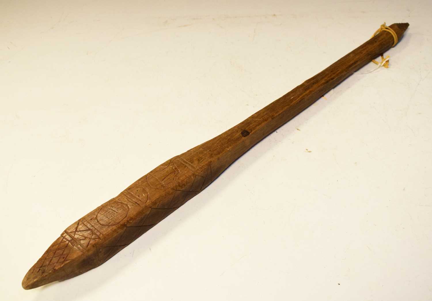 Wooden club, round handle to square pointed top,