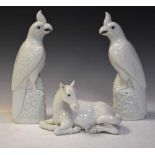 Pair of Chinese Dehua-style blanc de chine porcelain parakeets