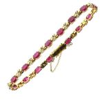 Unmarked yellow metal, ruby and diamond bracelet