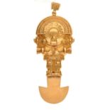 South American 18K yellow metal deity pendant