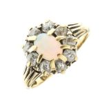 Yellow metal (18ct) ring set opal and diamonds