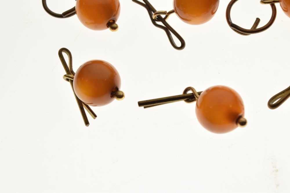 Collection of thirteen amber bead buttons, - Image 4 of 5