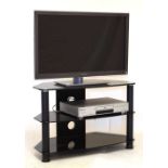 Panasonic 3D television and DVD Player on glass stand