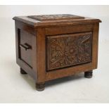 Oak floor standing box with carved panels