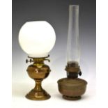 Two oil lamps, shades etc