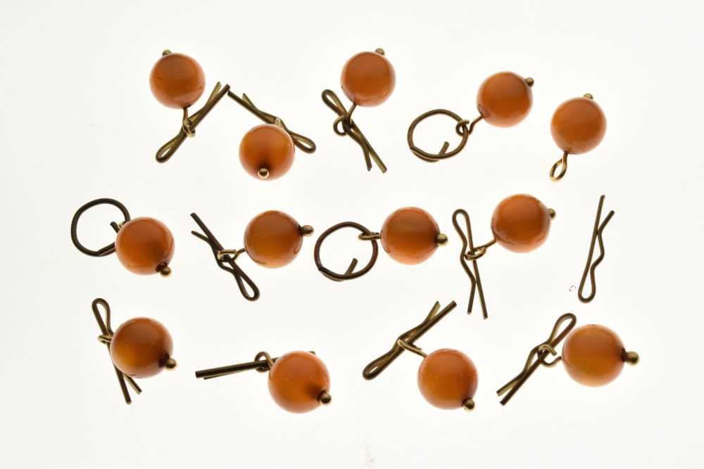 Collection of thirteen amber bead buttons, - Image 5 of 5