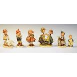 Group of Hummel figures and Hummel embroidery