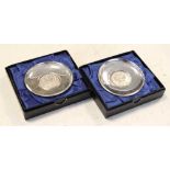 Pair of Elizabeth II Britannia standard silver pin dishes commemorating the 300th anniversary