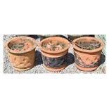 Set of three terracotta planters