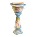 Floral pottery jardiniere and stand
