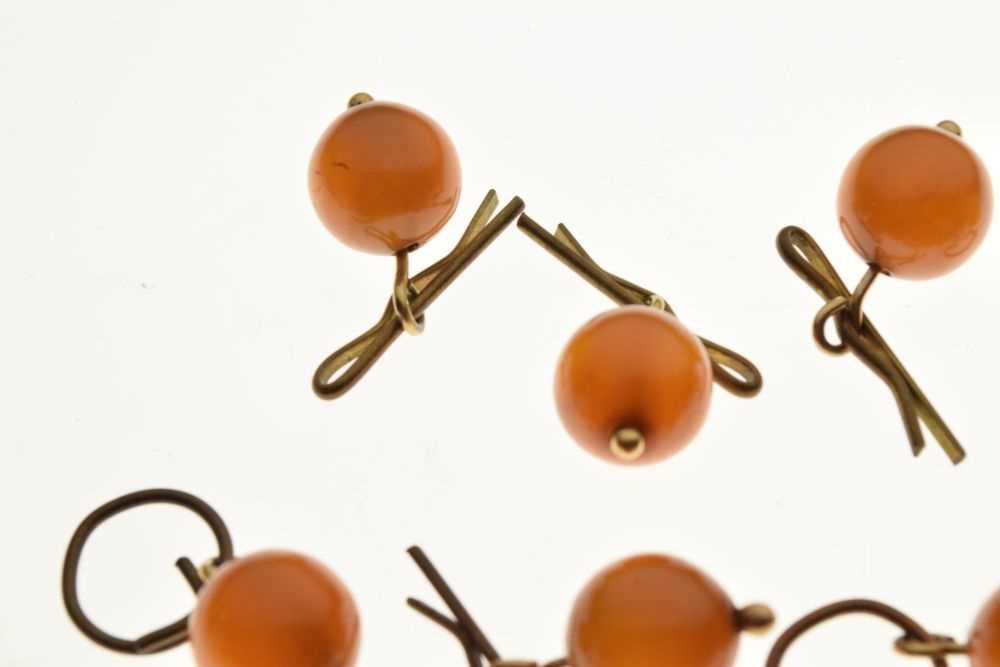 Collection of thirteen amber bead buttons, - Image 2 of 5