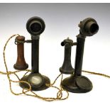 Two 'candlestick' telephones