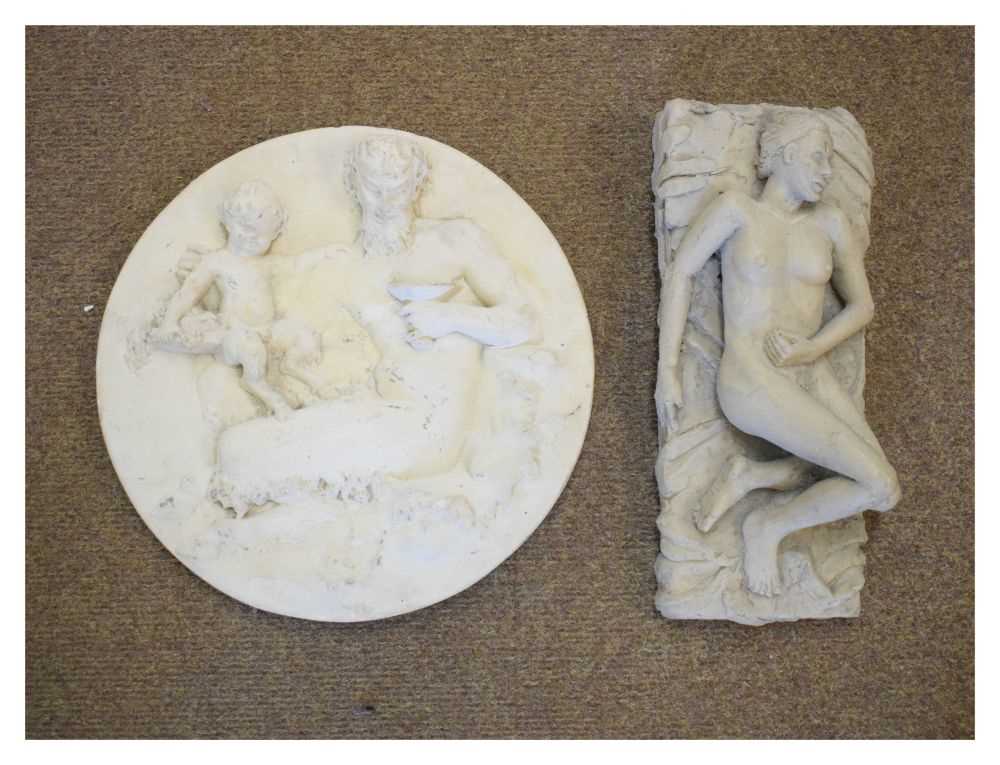 Plaster roundel depicting a satyr, together with a reclining figure