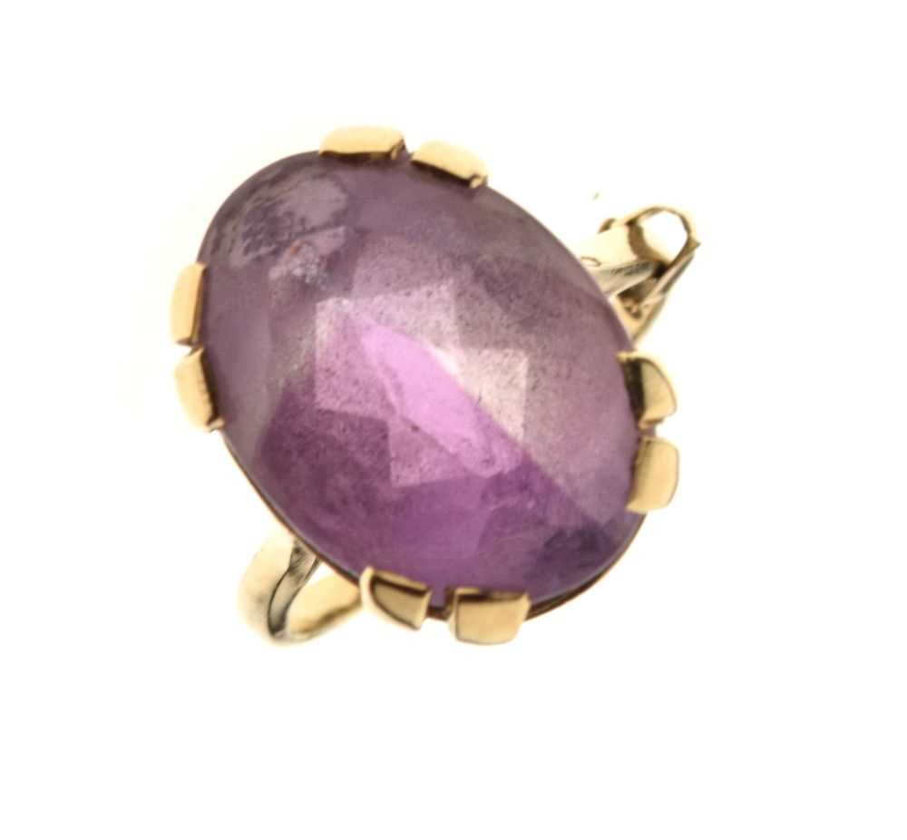 9ct gold dress ring set oval amethyst-coloured stone
