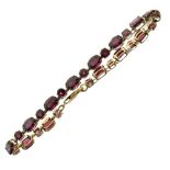 9ct gold bracelet set purple stones