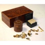 Two pairs gold plated cufflinks, etc in a table top box