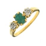 18ct gold, emerald and diamond three-stone ring