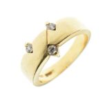 Yellow metal (750) ring set three white stones