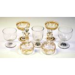 French gilt glass champagne coupes and bottles