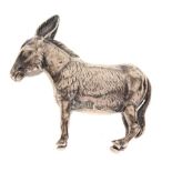 Cast white metal figure of a donkey