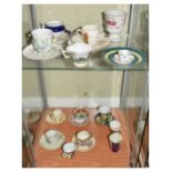 Group of cabinet cups etc