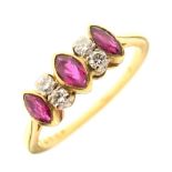 Yellow metal, ruby and diamond seven-stone ring