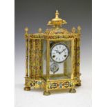 Reproduction French style brass and enamel four glass clock