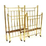 Two brass single beds