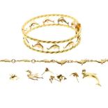Assorted yellow metal dolphin motif jewellery