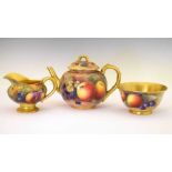 George V Royal Worcester porcelain fruit-painted teapot, milk jug and sugar basin