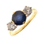 Sapphire and diamond three stone ring,