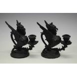 Pair Wyvern candlesticks