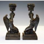 Pair of patinated bronze candlesticks