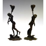 Unusual pair of bronze candlesticks modelled as witches