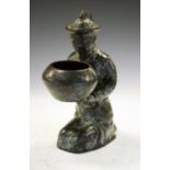Chinese metal figure with bowl