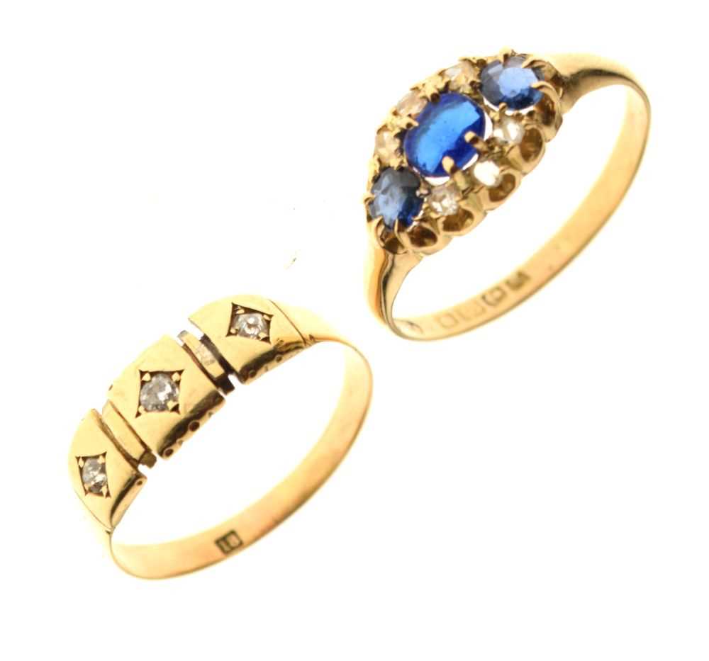 18ct three-stone diamond ring, size Q, and a 18ct gold ring set paste, sapphires and diamonds