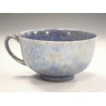 Ruskin pottery tea cup in lustre blue glaze