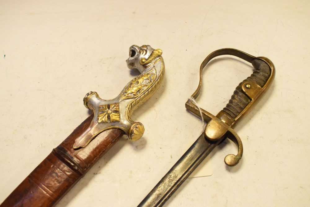 Indian sword and Imperial German sabre.