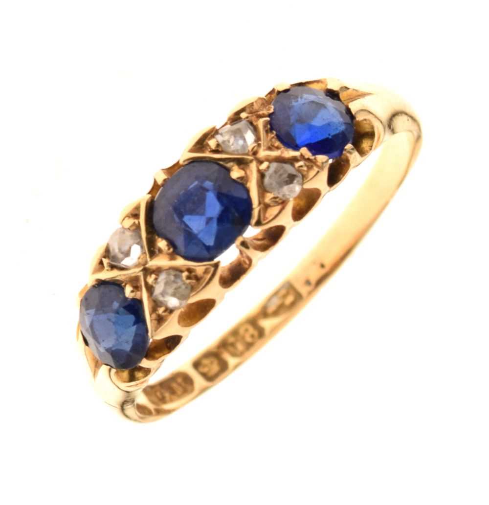 Blue garnet topped doublet and diamond 18ct gold ring