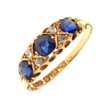 Blue garnet topped doublet and diamond 18ct gold ring